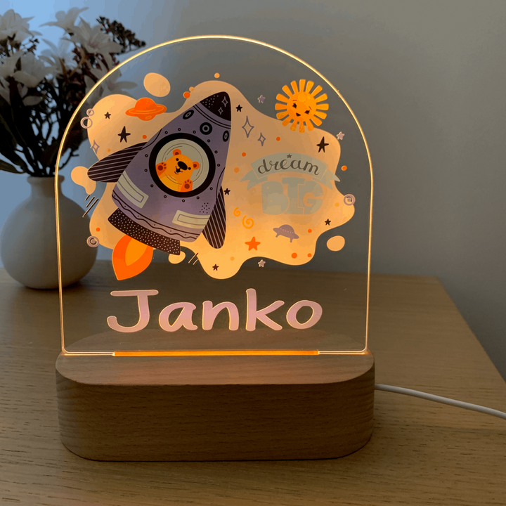 Cute personalised night light with warm LED  lights. Printed Cute Space Bear in a rocket. Customisable name